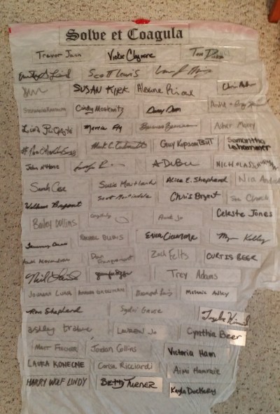 "Offerings": signatures of all 68 initiates on glass to be fused into an artwork.